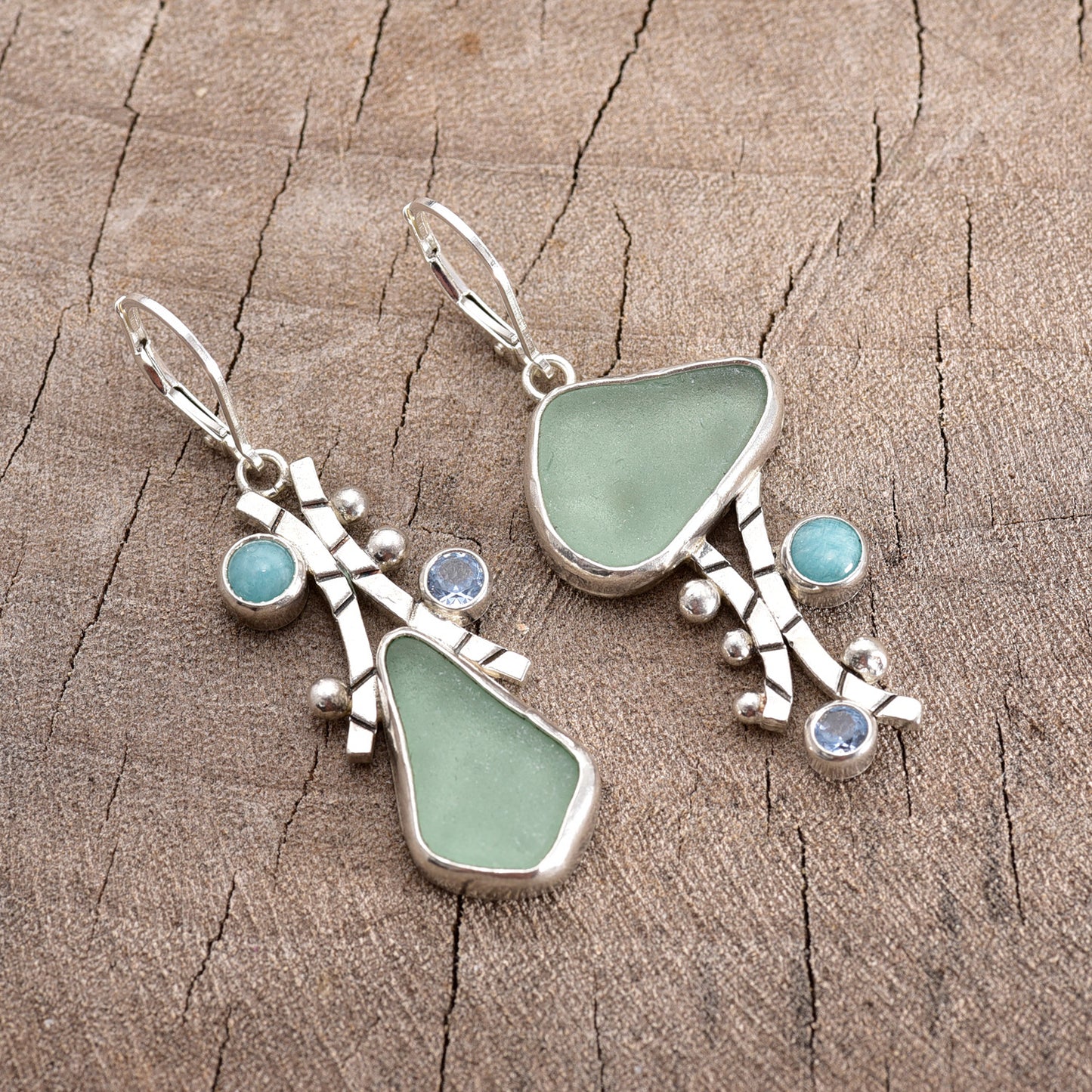 Artisan sea glass earrings in shades of soft seafoam green in hand crafted settings of sterling silver (E758)