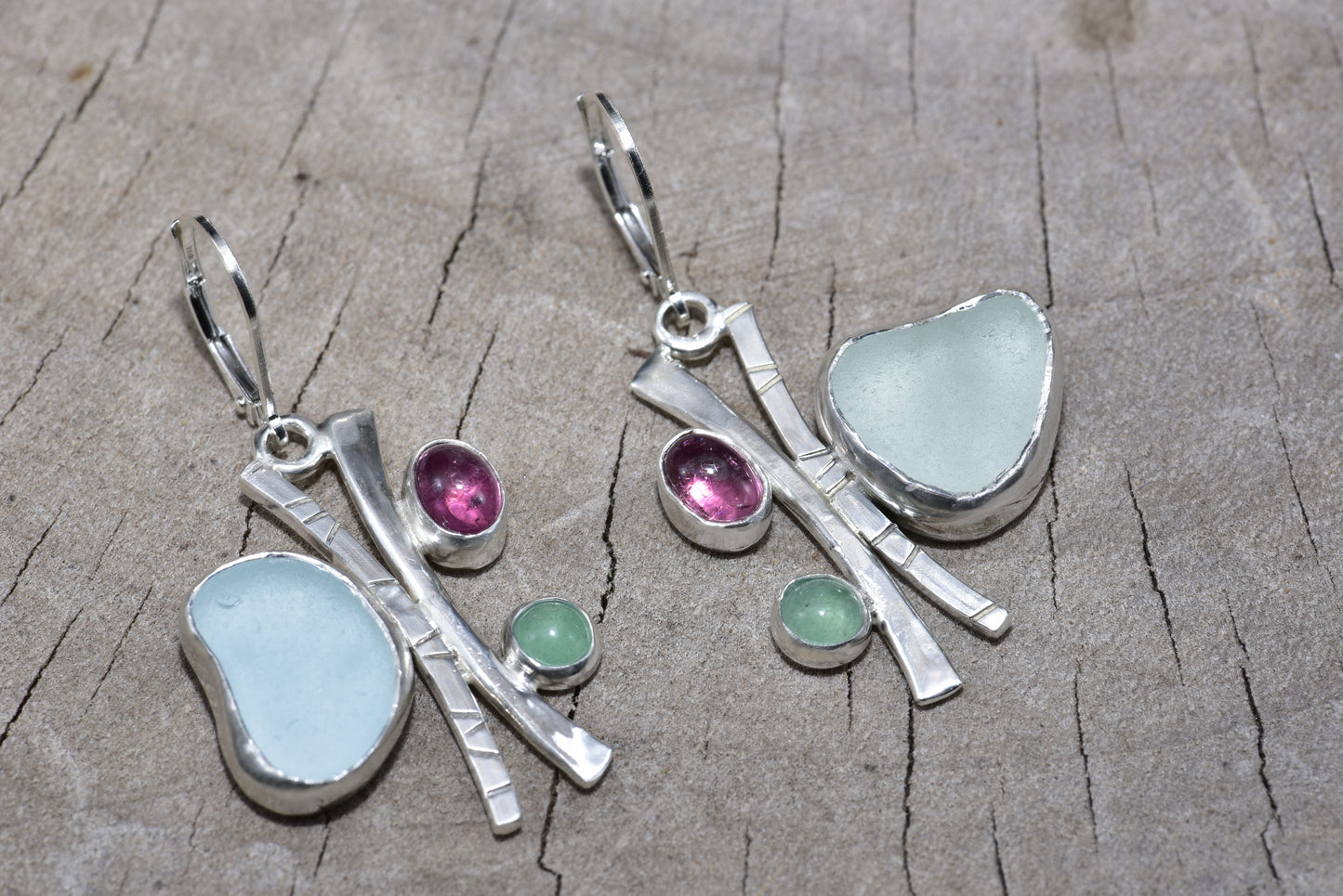 Sea glass earrings in sterling silverSea glass and gemstone earrings in hand crafted settings of sterling silver. (E839)
