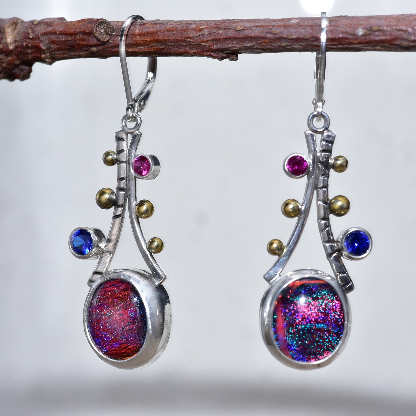 Fused dichroic glass earrings in hand crafted settings of sterling silver accented with 18K gold (E871)