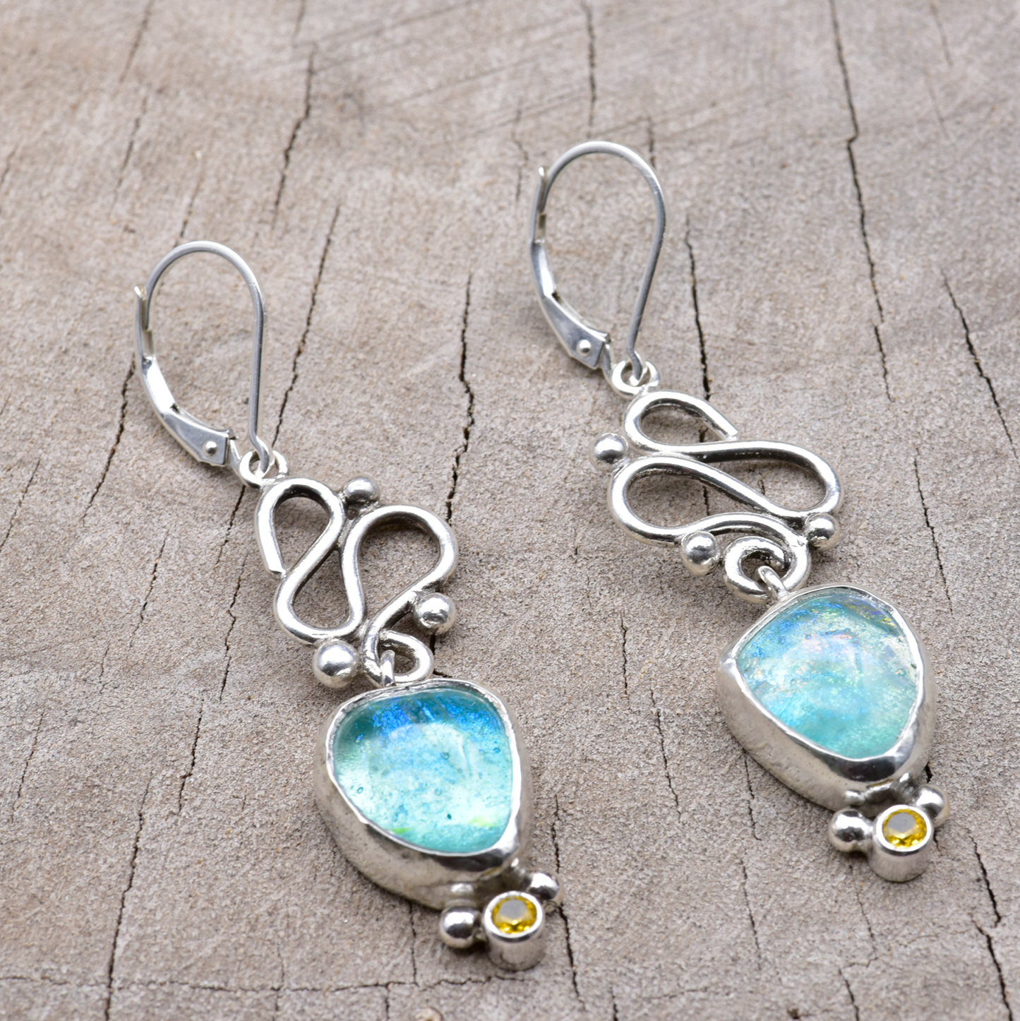 Fused dichroic glass earrings in handmade settings of sterling silver accented with sparkly cubic zirconias (E902)