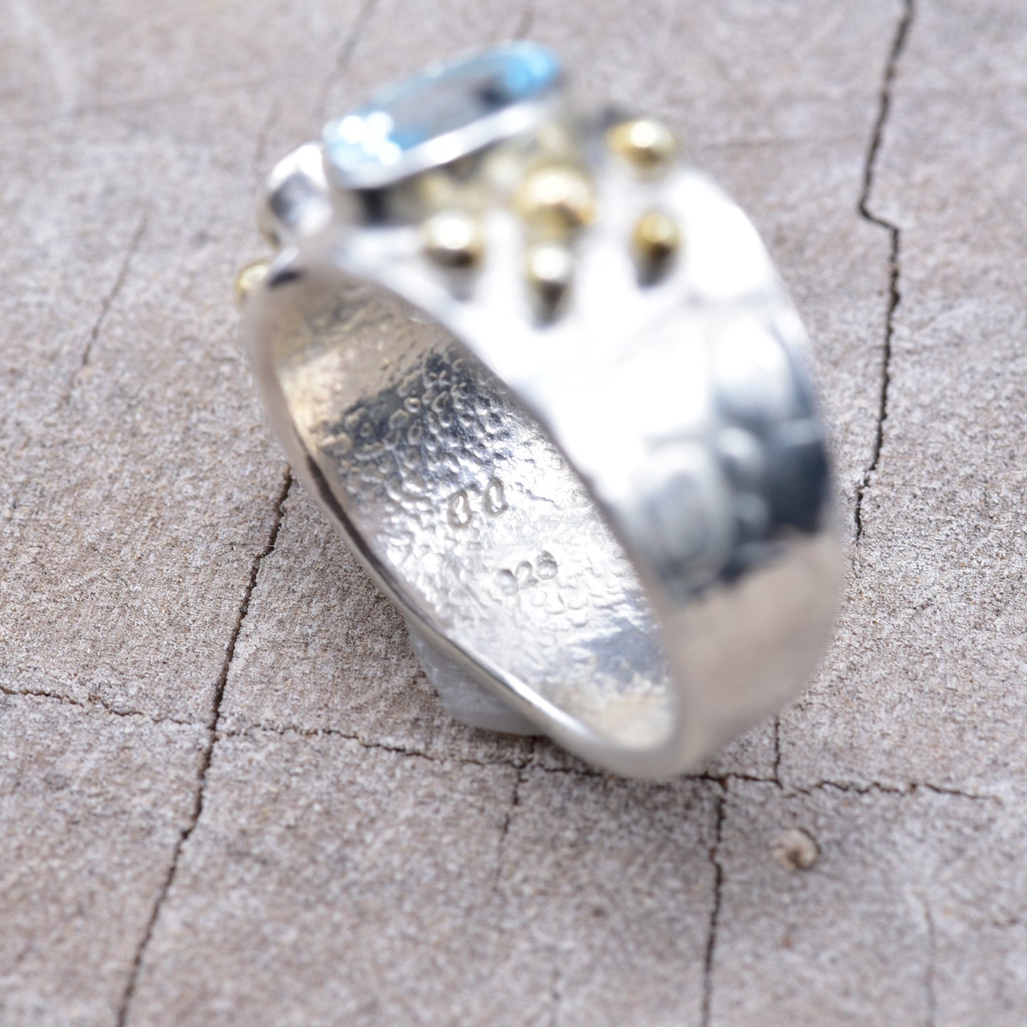 Gemstone ring in a handcrafted sterling silve accented with gold. (R938)