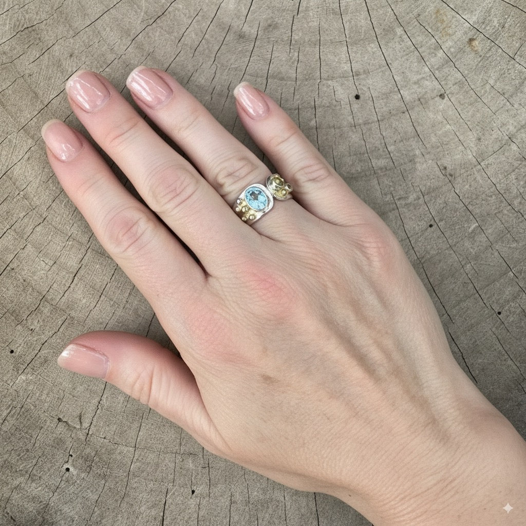 Gemstone ring in a handcrafted sterling silve accented with gold. (R938)
