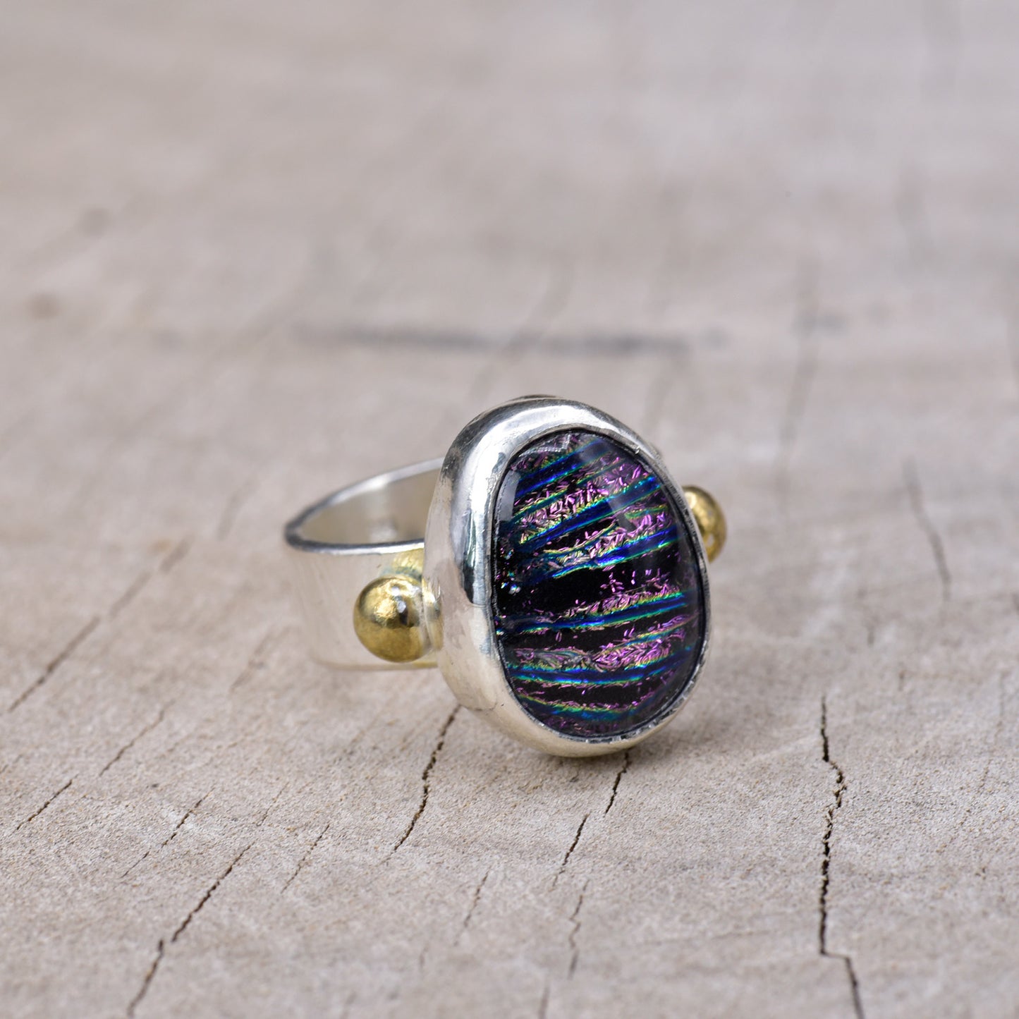 Fused dichroic glass ring in a handcrafted setting of sterling silver (R941)