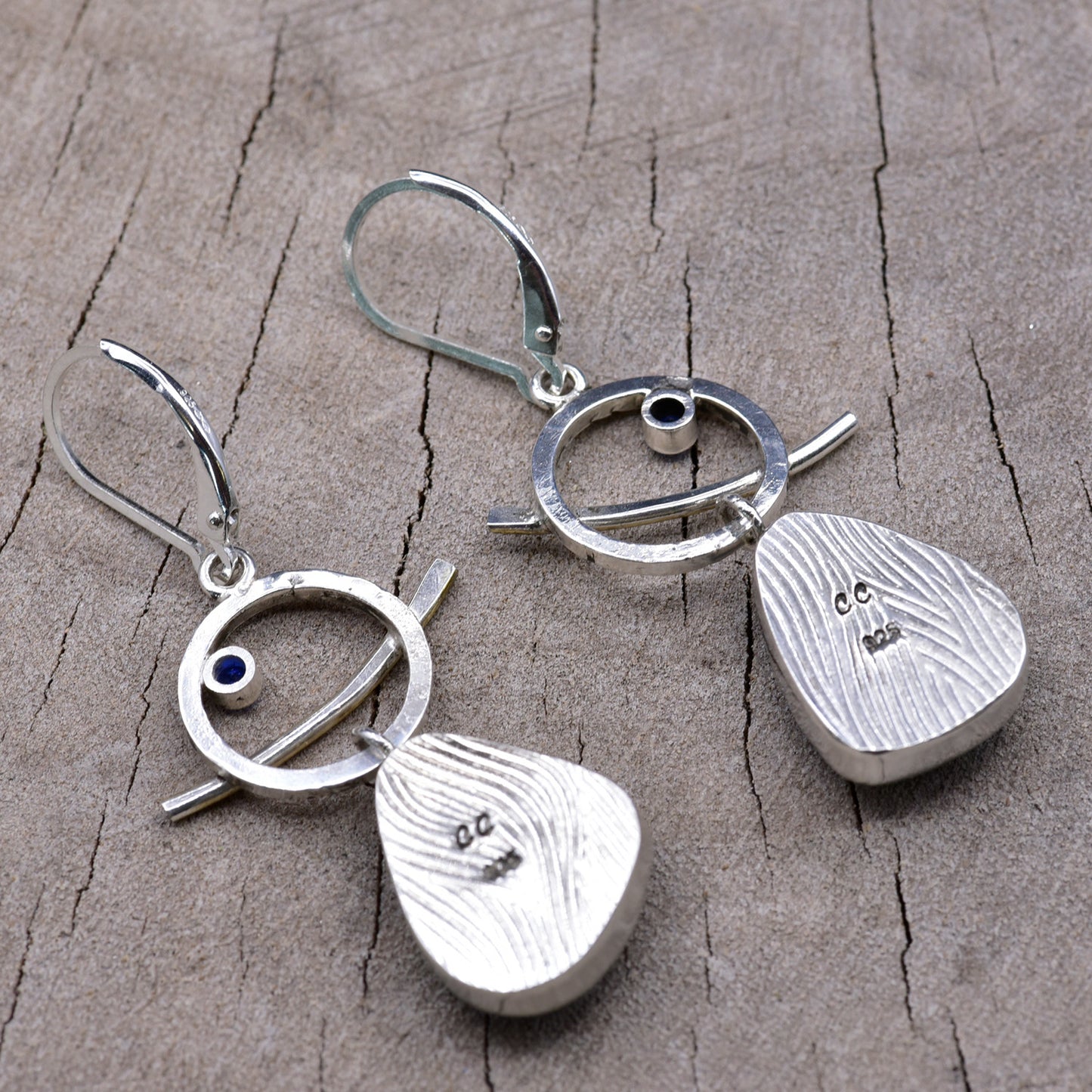 Fused dichroic glass earrings in hand crafted settings of sterling silver accented with gold (E947)