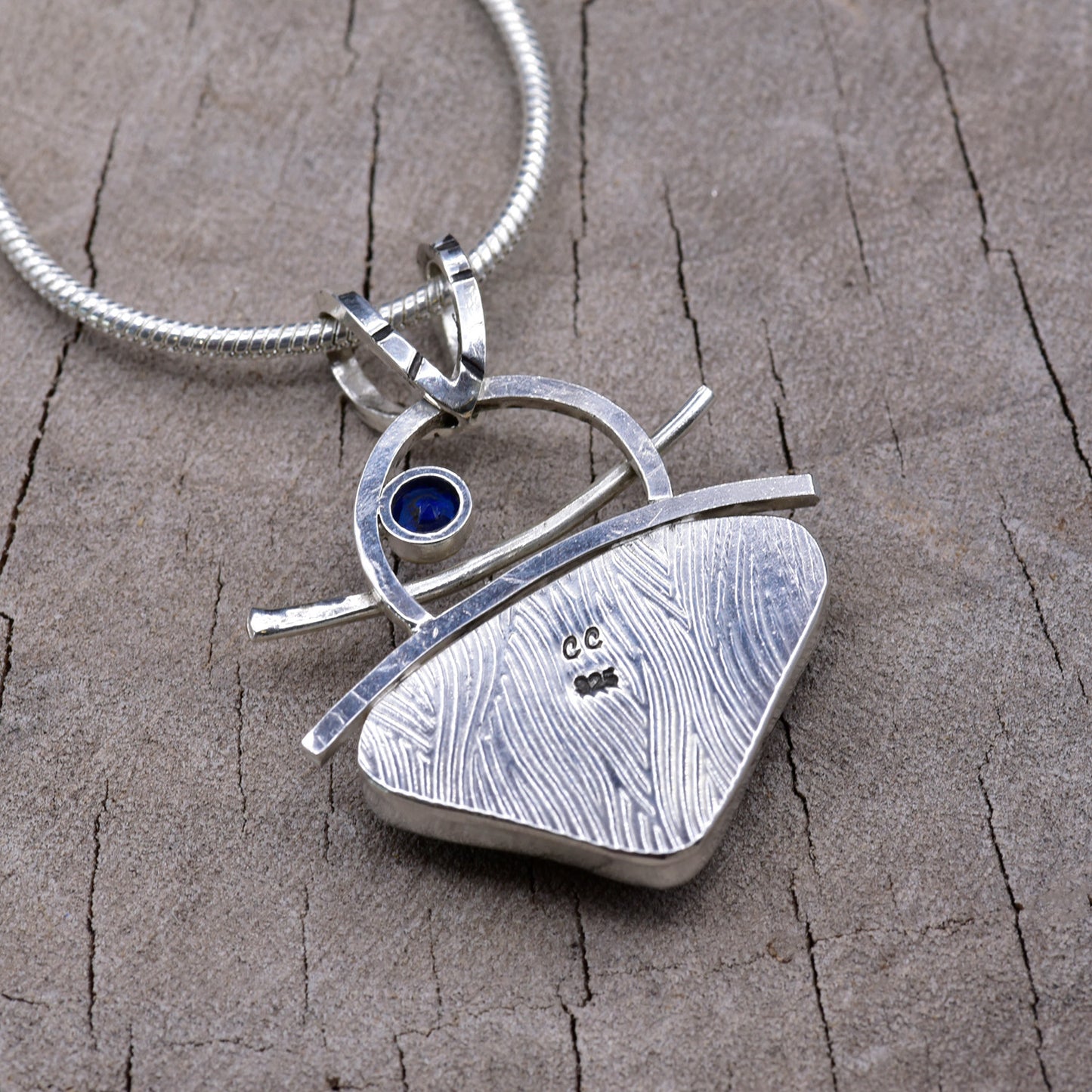 Fused dichroic glass necklace in a hand crafted setting of sterling silver accented with gold (N948)