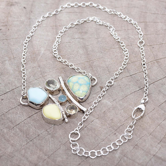 Milk glass and enamel necklace with semi-precious gemstones in a hand crafted setting of tarnish resistant sterling silver. (N740)