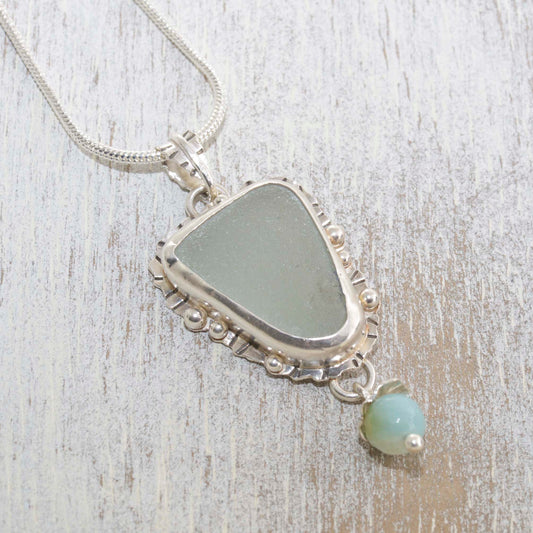 Sea glass pendant necklace hand crafted of tarnish resistant sterling silver accented with an amazonite dangle. (N490)