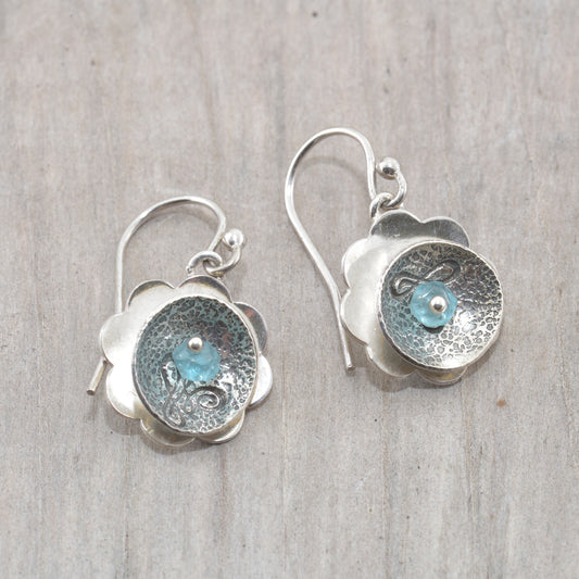 Handmade sterling silver earrings accented with an aqua apatite bead. (E543)