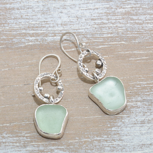 Sea glass earrings in hand crafted sterling silver settings. (E628)