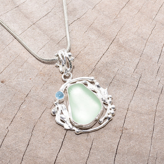 Sea glass necklace in a hand crafted sterling silver setting. (N633)