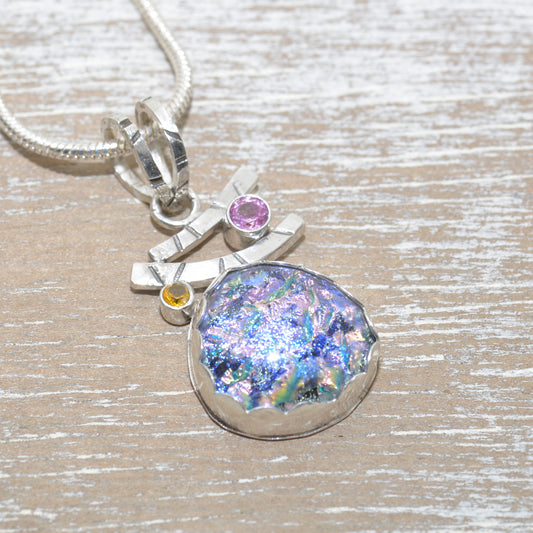 Dichroic glass pendant necklace in a handcrafted sterling silver setting. (N682)