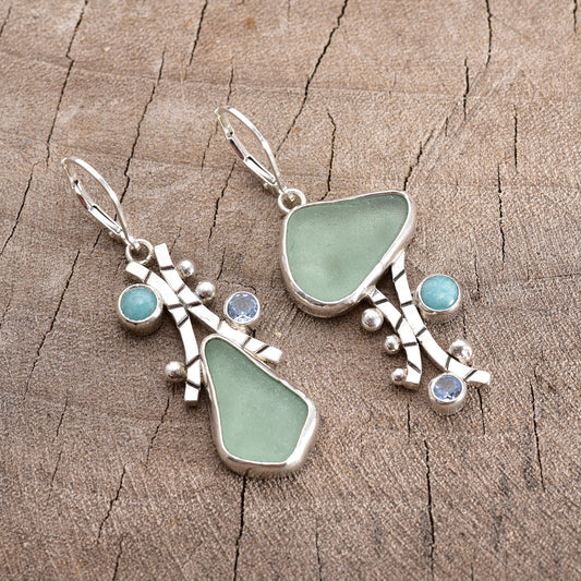 Artisan sea glass earrings in shades of soft seafoam green  in hand crafted settings of sterling silver (E758)
