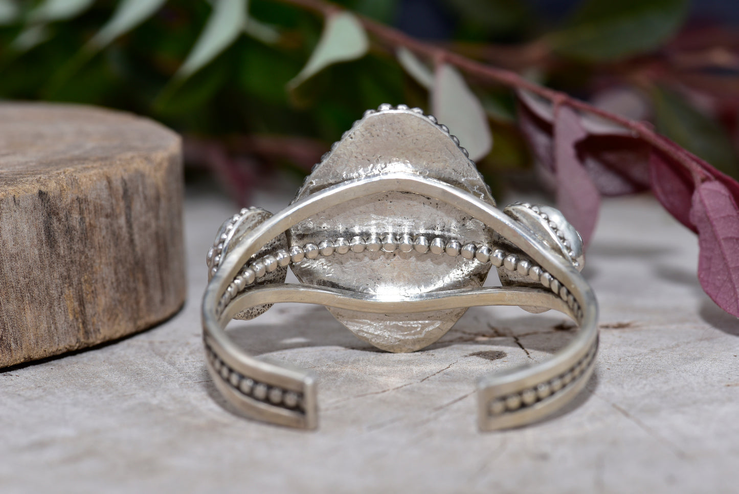 Sea glass and stone cuff bracelet in a hand crafted setting of sterling silver. (B832)