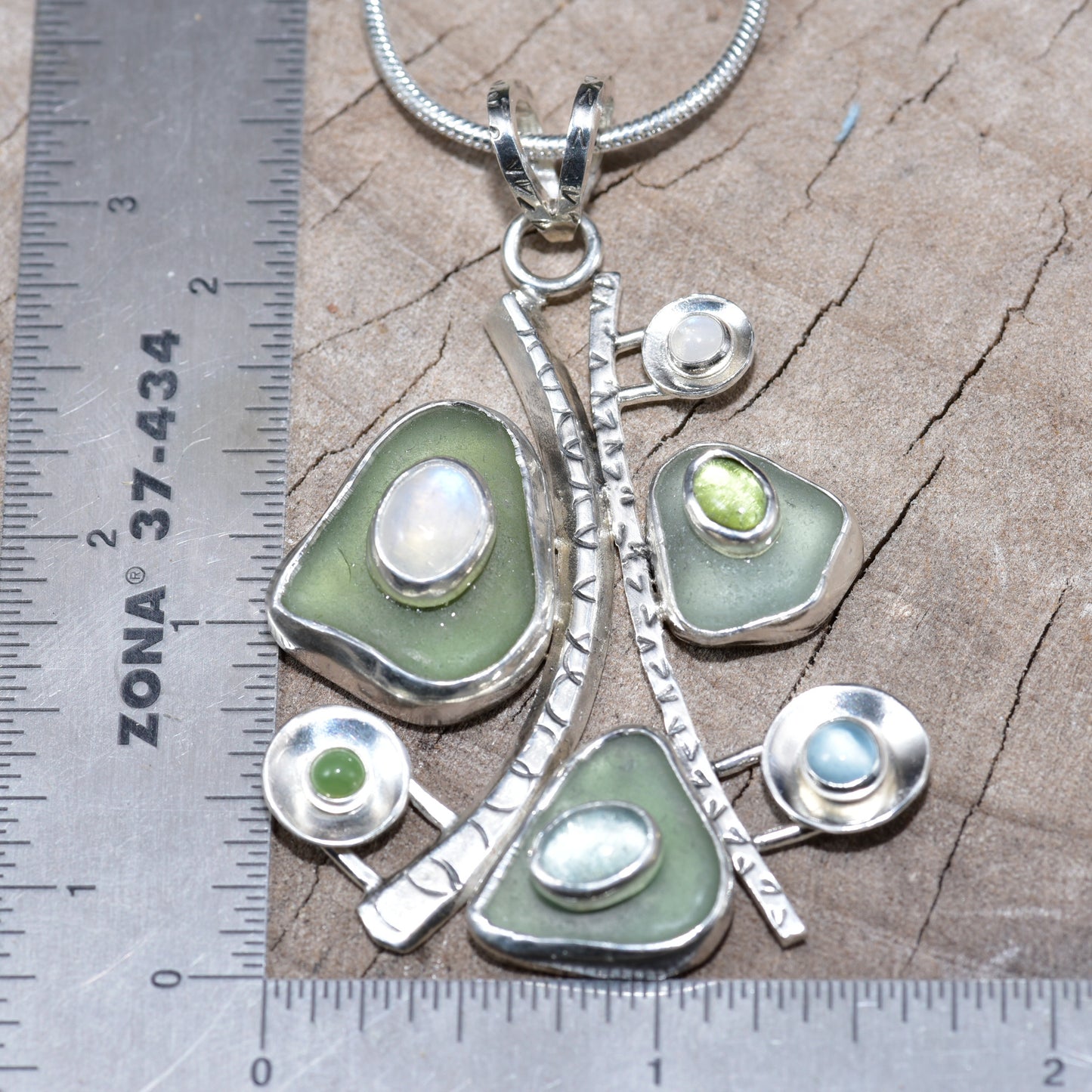 Sea glass and gemstone pendant necklace in a hand fabricated sterling silver setting (N834)