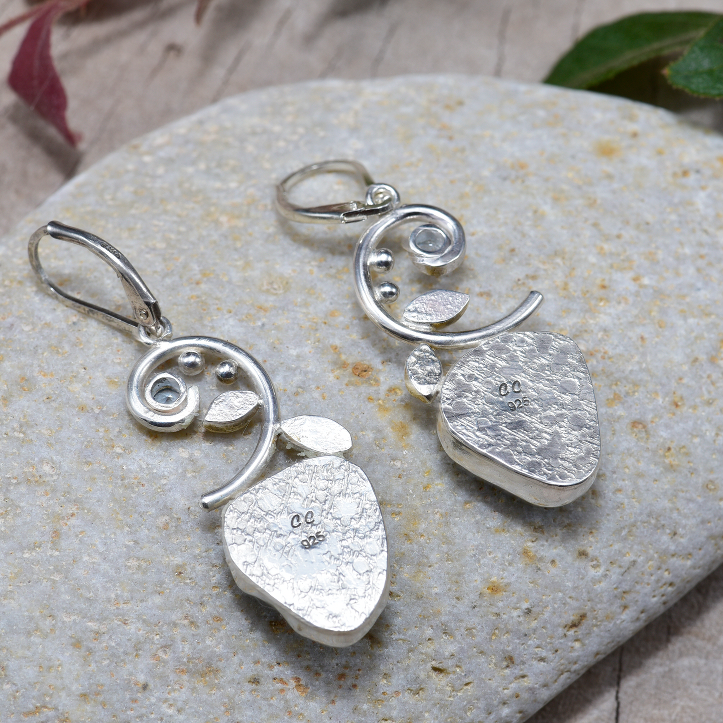 Sea glass earrings in hand crafted settings of sterling silver accented with sparkly cubic zirconias (E838)