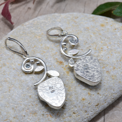 Sea glass earrings in hand crafted settings of sterling silver accented with sparkly cubic zirconias (E838)