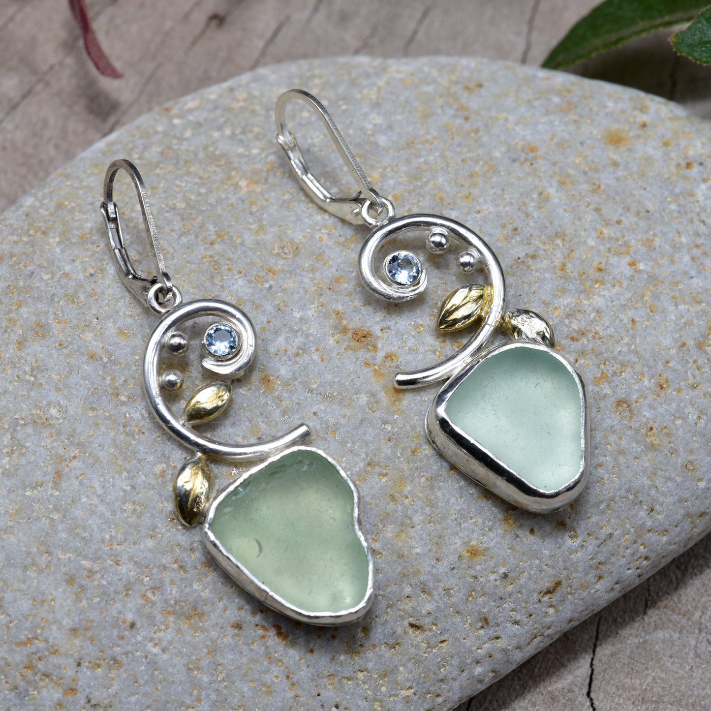 Sea glass earrings in hand crafted settings of sterling silver accented with sparkly cubic zirconias (E838)
