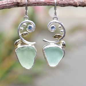 Sea glass earrings in hand crafted settings of sterling silver accented with sparkly cubic zirconias (E838)