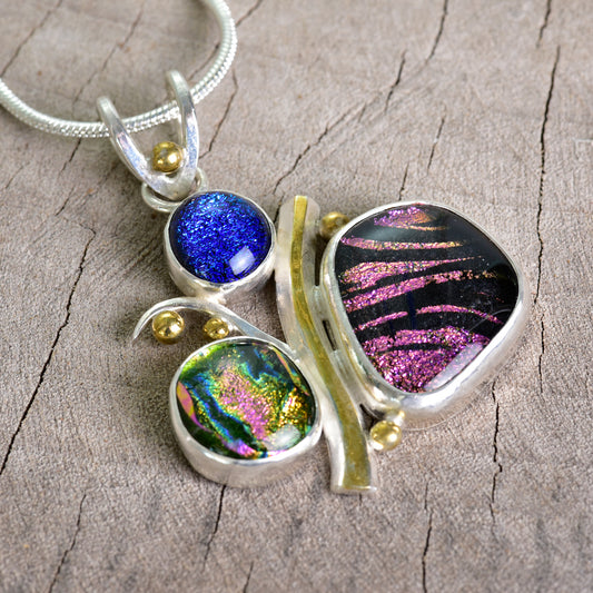 Fused dichroic glass necklace in a hand crafted setting of sterling silver accented with gold (N927)