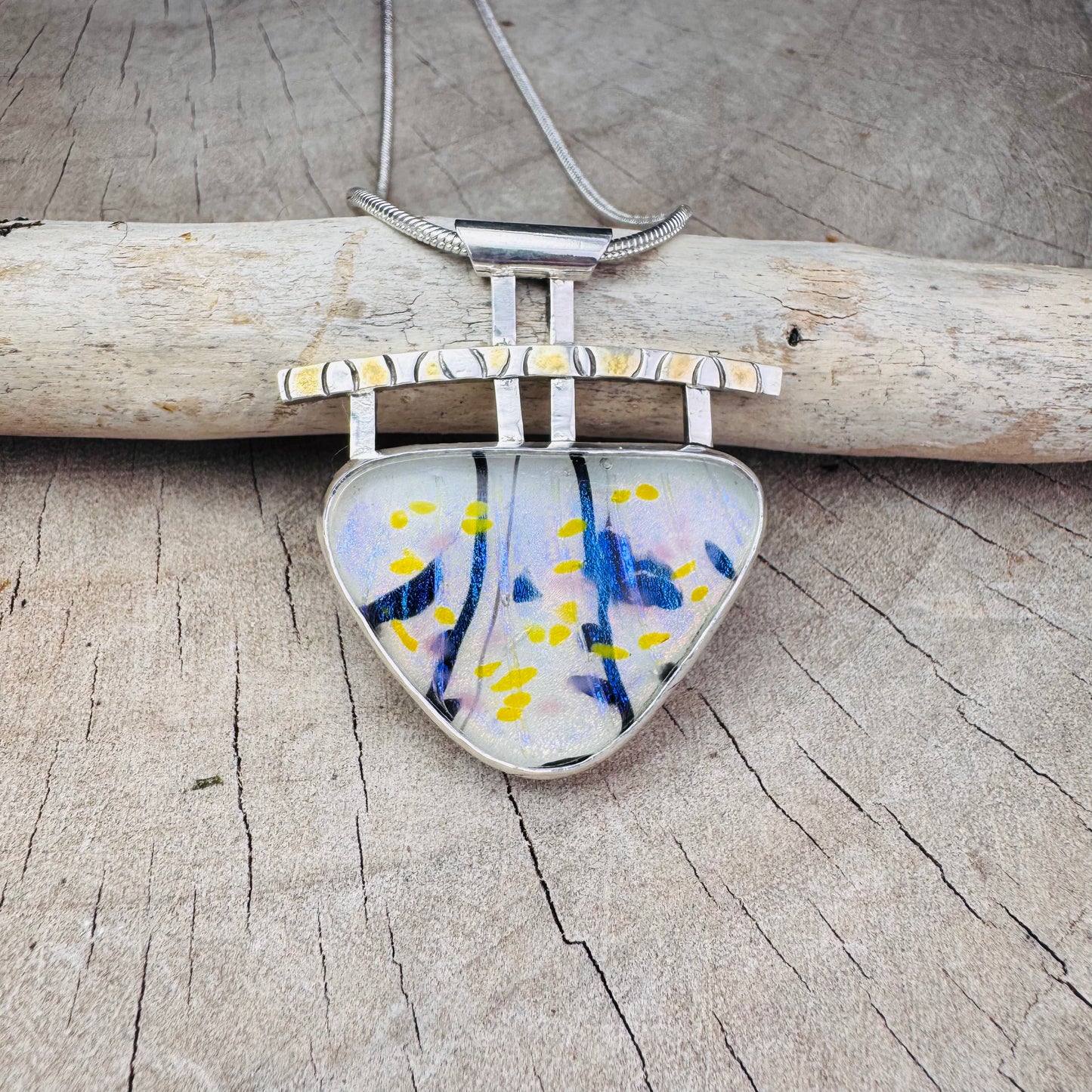 Artistic fused dichroic glass necklace in a hand crafted setting of sterling silver accented with gold (N930)