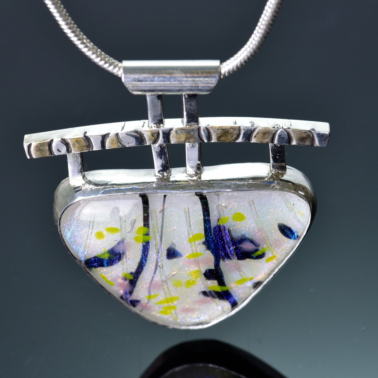 Artistic fused dichroic glass necklace in a hand crafted setting of sterling silver accented with gold (N930)