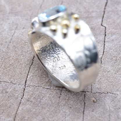 Gemstone ring in a handcrafted sterling silve accented with gold. (R938)