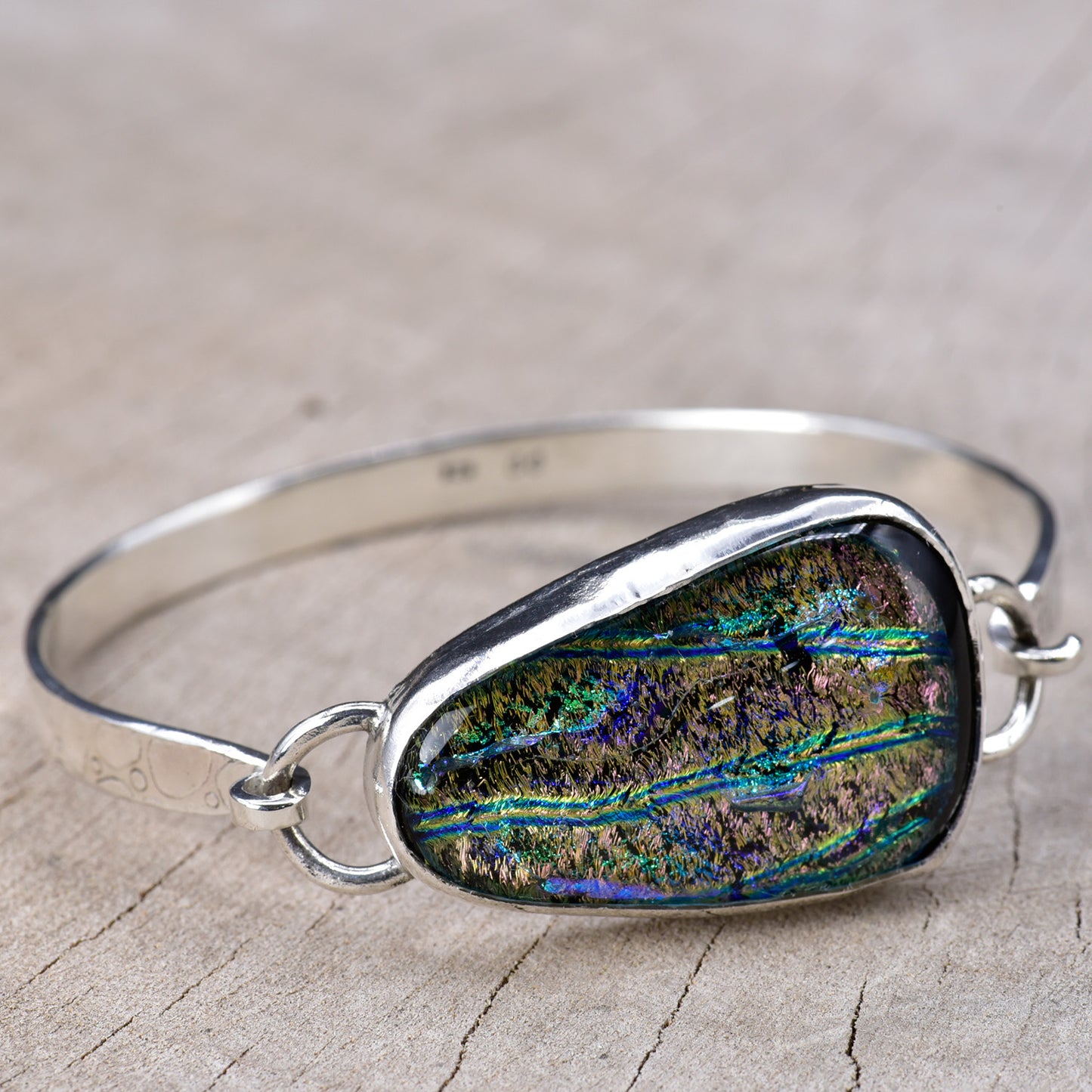 Cuff bracelet with custom fused dichroic glass cabochon in a handmade sterling silver setting (B955)