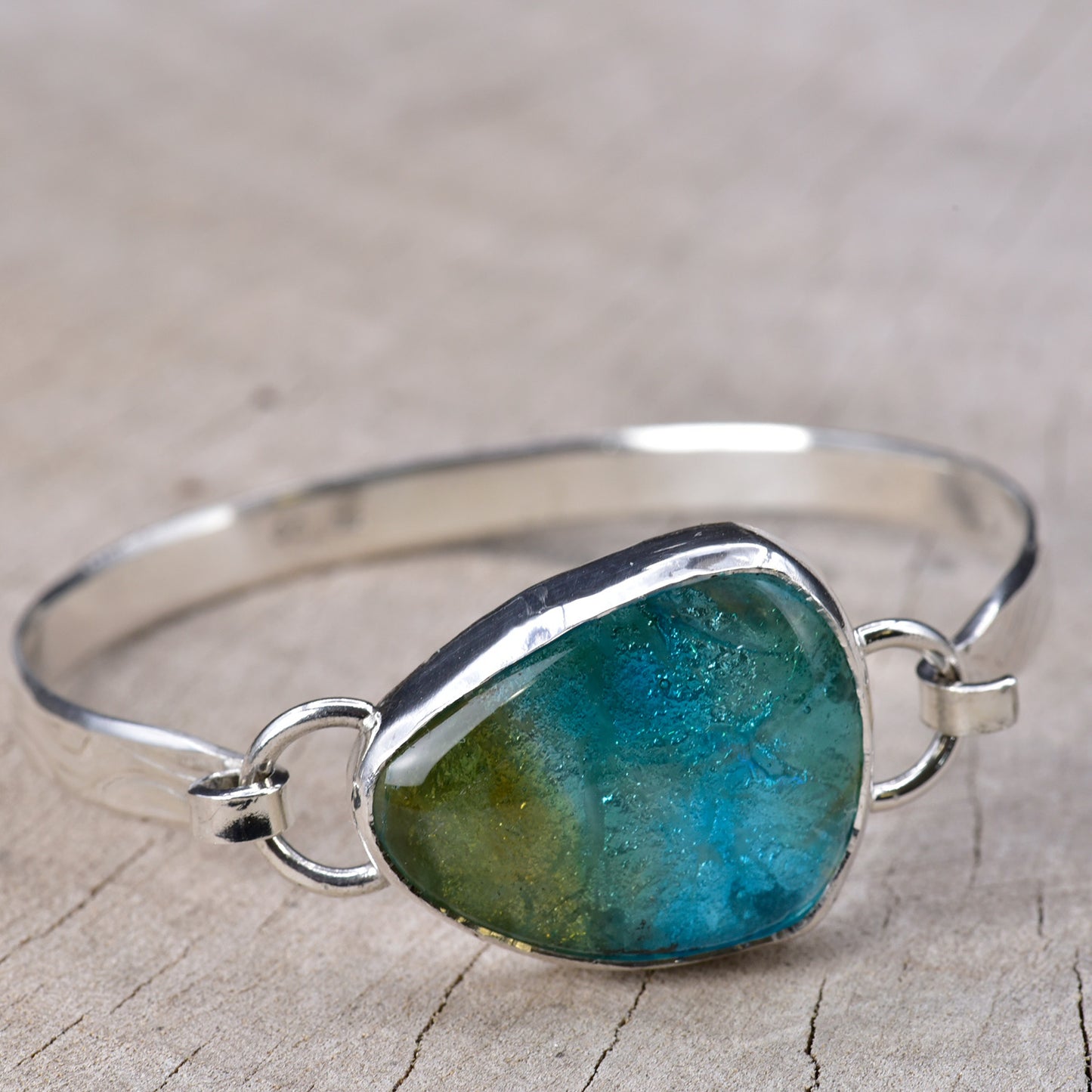 Cuff bracelet with custom fused dichroic glass cabochon in a handmade sterling silver setting (B956)