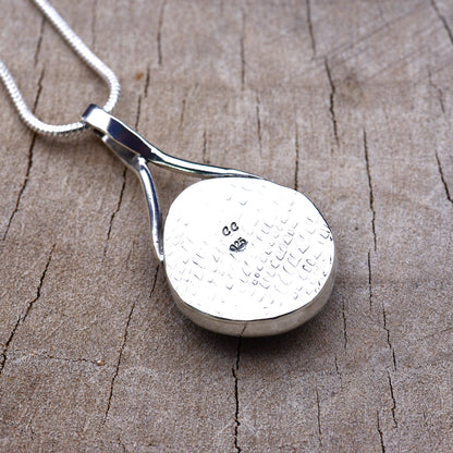 Back of the pendant showing the embossed texture, CC maker's mark and 925 sterling silver hallmark.