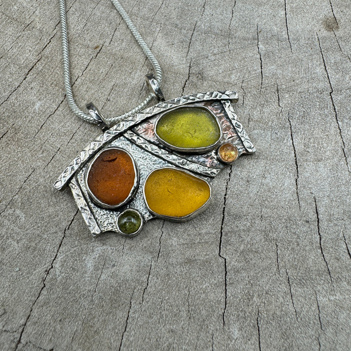 Sea glass pendant necklace in mixed metals of sterling silver and copper. (N433)