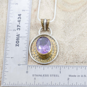 Sparkly amethyst CZ pendant necklace in an original handmade setting of brass and sterling silver. (N126)