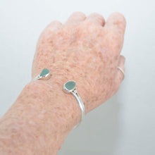 Load image into Gallery viewer, Sea glass cuff bracelet in a hand made sterling silver setting. (B399)
