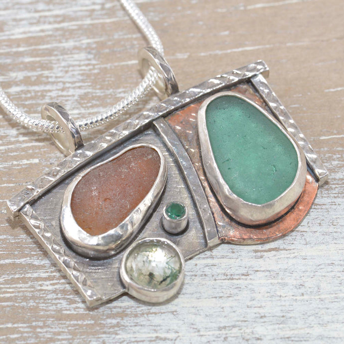 Seaglass pendant necklace in mixed metals of sterling silver and copper. (N432)