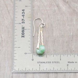 Hand made trapeze earrings capture semi-precious chrysoprase gemstone beads between twists of sterling silver. (E451)