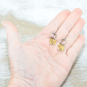 Whimsical handstamped mixed metal earrings of sterling silver and brass. (E454)