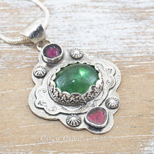 Load image into Gallery viewer, Boho style pendant necklace with a large green tourmaline in  hand crafted sterling silver setting accented with watermelon tourmaline slices. (N513)
