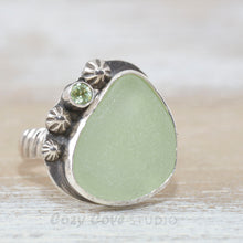 Load image into Gallery viewer, Sea glass ring with pale green sea glass accented with  a sparkly peridot in sterling silver. (R528)
