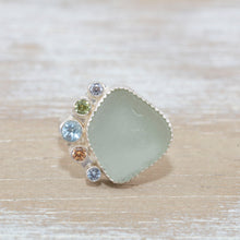 Load image into Gallery viewer, Sea glass ring with pale green sea glass accented with sparkly cubic zirconias  in sterling silver. (R532)
