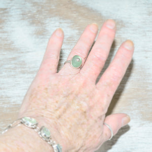 Sea glass ring with a hand crafted stud in a setting of fine and sterling silver. (R562)