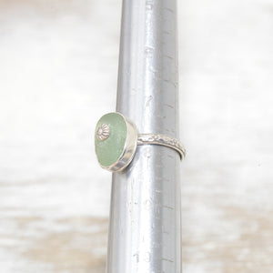 Sea glass ring with a hand crafted stud in a setting of fine and sterling silver. (R562)
