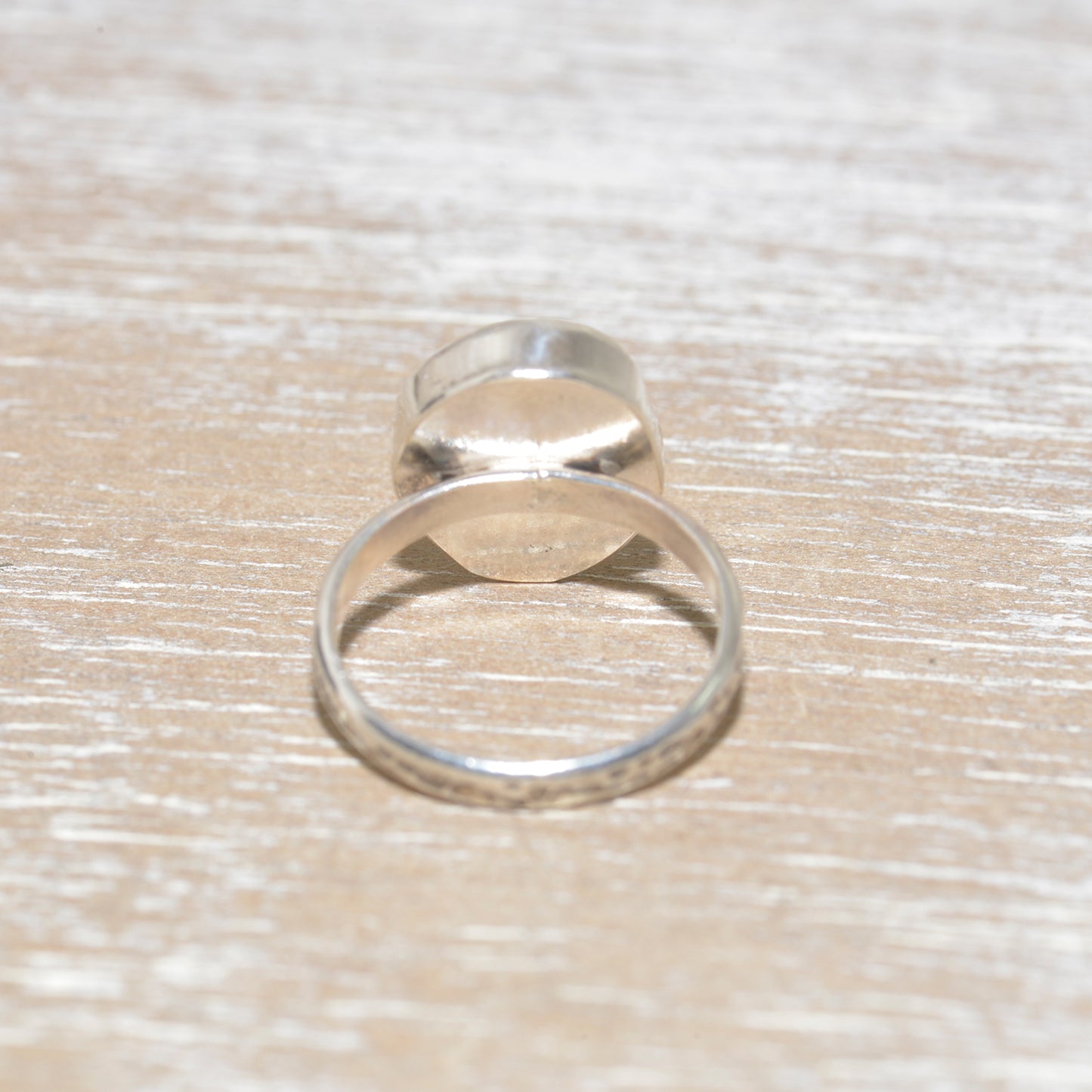 Sea glass ring with a hand crafted stud in a setting of fine and sterling silver. (R563)