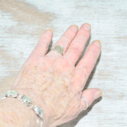 Sea glass ring with a hand crafted stud in a setting of fine and sterling silver. (R563)