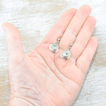 Load image into Gallery viewer, Sea glass earrings in pale green accented with sterling silver studs. (E577)
