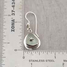 Load image into Gallery viewer, Sea glass earrings in pale green accented with sterling silver studs. (E577)
