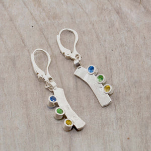 Sparkly dangle earrings with colorful cubic zironias in hand crafted settings of sterling silver. (E583)