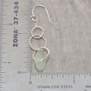 Sea glass dangle earrings on circle of sterling silver beaded wire. (E594)