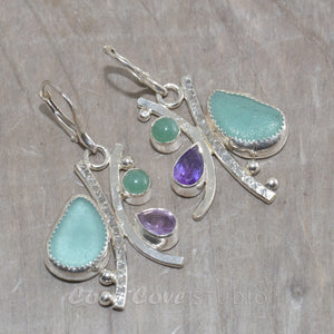 Sea glass and semi-precious stone earrings in hand crafted settings of tarnish resistant sterling silver.