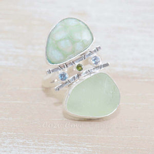 Sea glass and vitreous enamel ring in a hand crafted setting of sterling silver accented with sparkly cubic zirconias. (R614)