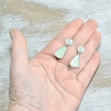 Load image into Gallery viewer, Sea glass earrings in hand crafted sterling silver settings accented with semi-precious gemstones of pale blue topaz (E616)
