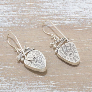Sea glass earrings in hand crafted sterling silver settings. (E627)